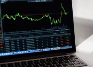 Laptop screen showing day trading alerts